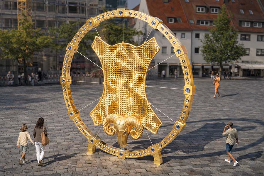 metallic ram head artwork with glittering disc-covered panel